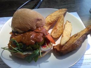Moroccan Vegan Burger with potato wedges at Licorish Bistro in Johannesburg