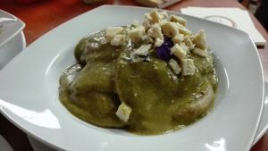 ravioles de queso con salsa pesto at Vida Vegan Bistro in Cusco