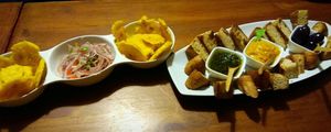 Garlic bread and patacones.  at Vida Vegan Bistro in Cusco