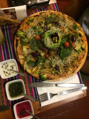 Veggie pizza (best I’ve ever tasted) 🥰 at Vida Vegan Bistro in Cusco