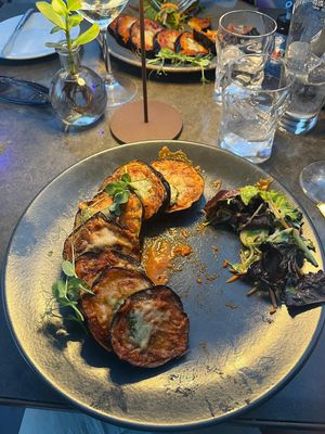 Aubergine parmigiana, with fries. Very tasty! at Naar RestoBar in St Julians