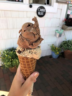 Minty dark chocolate + mint chunky chip on a waffle cone.  at Sticky Sweet in Portland