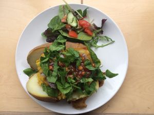 Jacket potato with lentil dahl.  at Larder in Brighton