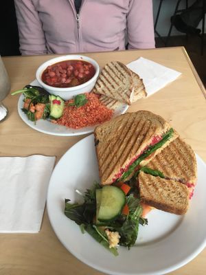 Chunky hummus toasted sandwich and tagine  at Larder in Brighton