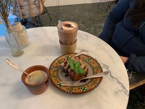 Warming up with coffee, hot chocolate and banana bread   at Pura in Luzern