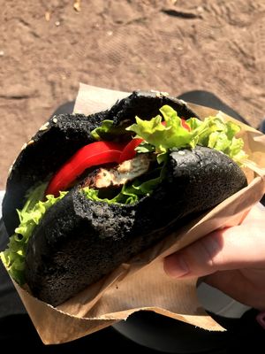 Tofu burger with a black bun at Ugol in Moscow