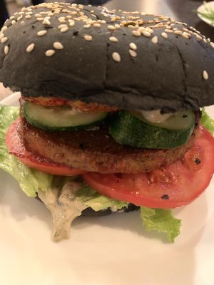 seitan burger layered with french fries  at Ugol in Moscow