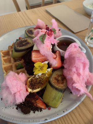 Waffles with bananas, chocolate soil, mixed berries and candy floss! at Comes and Goes in Lower Hutt