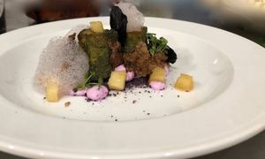 Red cabbage consommé  with potato and apple chutney  at The Alchemist Kitchen in Berlin