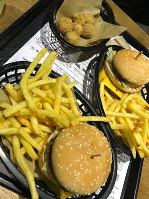 The Big Earth burgers and popcorn chicken  at Earth Restaurant & Takeaway in Petersfield