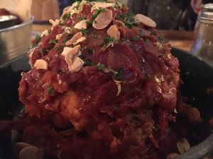 Whole roasted cauliflower with tomato sauce  at Source in York