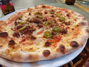 Vegan Diavola pizza (seitan salami, onions, red pepper, jalapeños) at Sa Cova in Mallorca