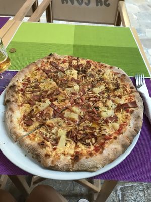 Capricioze pizza with vegan bacon. Delicious at Sa Cova in Mallorca