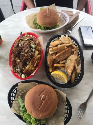 Hoisin Duck Fries, Mixed Seafood Basket and 2 burgers. All Vegan! at The Fish Shack in Canberra
