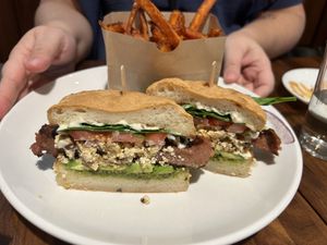 Breakfast sando with sweet potato fries   at Sibling by Pushkin in Sacramento