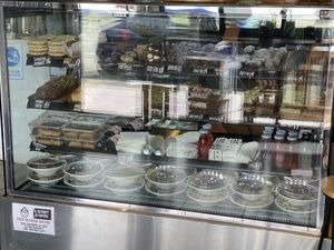 Treats in a cabinet   at Charlie's Raw Squeeze - Clontarf in Moreton Bay Region
