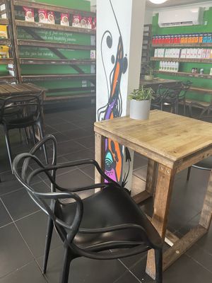 Some Indoor seating   at Charlie's Raw Squeeze - Clontarf in Moreton Bay Region