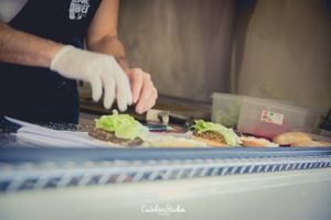 Hands at The Veggie Burger Club Food Truck in Buenos Aires