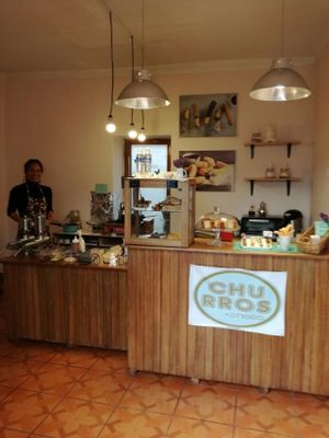 The lovely owner! at The Churro Bar & Vegan Bakery in Cusco
