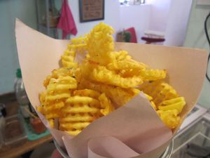 Waffle fries, sweet potato fries , yucca fries or regular fries at The Churro Bar & Vegan Bakery in Cusco