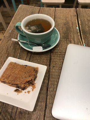 Peppermint tea with vegan peanut butter blondie  at Carmel by the Green in East London