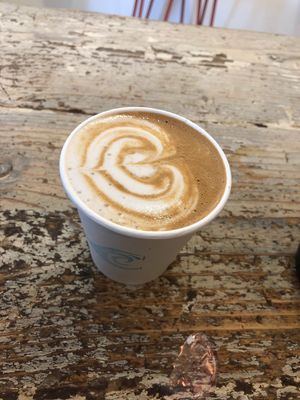 Flat white art  at Carmel by the Green in East London