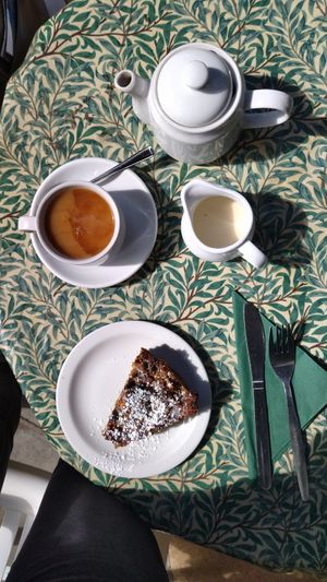 With tea at The Kew Greenhouse Cafe in Richmond Upon Thames