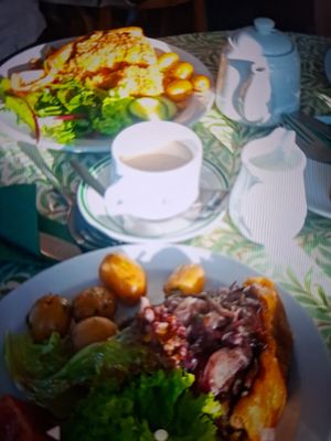 Vegan quiche with caramelised onion at The Kew Greenhouse Cafe in Richmond Upon Thames