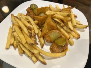 Nuggets with Buffalo sauce and fries  at Go Green in La Paz