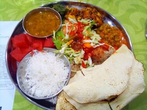 Mix of 3 dishes, salad, breads and rice at Cantina Indiana in Lisbon