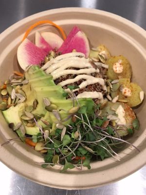 Peacebowl with Quinoa Protein Power Cereal, Avocado, Sprouts, Seeds, Japanese Yams, Watermelon Radish, Miso-Tahini Dressing at Good Choice Kitchen in Ossining