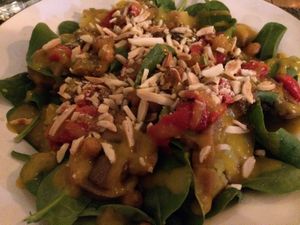 Sweet potato salad with roasted red pepper, chickpeas, spinachs, almonds and mango sauce at Bruta Flor in Lisbon