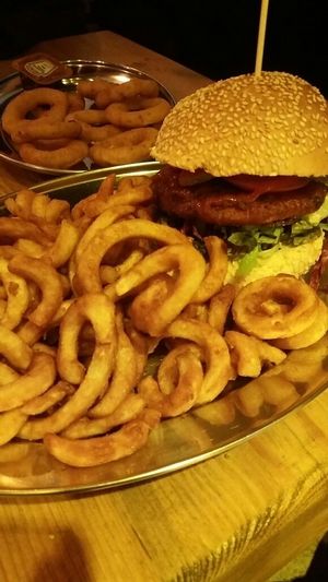 Sweet potato burger with curly fries and onion rings at KreuzBurger - Rosenthaler in Berlin