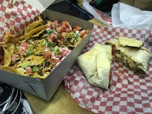 Loaded nachos and crunch wrap at The Hearty Hooligan in Hamilton