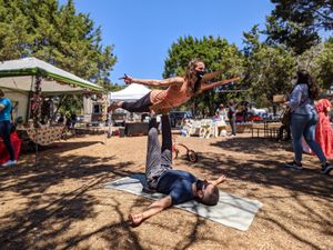 Acroyoga at the Vegan Shop-Up and Revolution Kitchen. at Revolution Vegan Kitchen in Austin