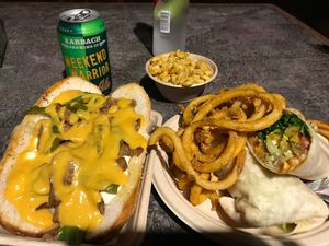 Buffalo wrap is our favorite. Steak/cheese too filling for us but good! at Revolution Vegan Kitchen in Austin