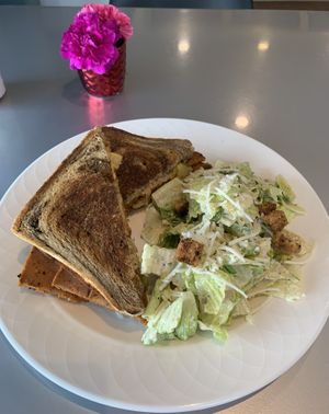 The Rueben sandwich with side Ceaser salad  at Hearts Choices - NorthEast in Calgary