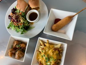 French Onion Dip Sandwich, Sesame Ginger Maple cauliflower wings, jackfruit poutine, corn dog at Hearts Choices - NorthEast in Calgary