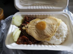 Topped with a fried "egg" at Hearts Choices - NorthEast in Calgary