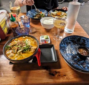 laksa in the front; stir fried vegies in soya bean sauce at the back at CHOW in Darwin