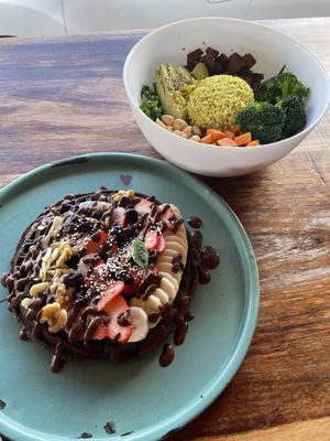 Cacao Waffles and a custom buddha bowl 💚  at Fresco Habito in Playa Del Carmen