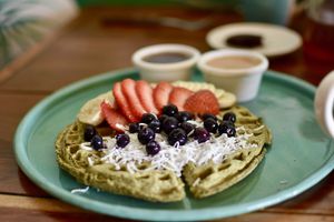 Waffles matcha  at Fresco Habito in Playa Del Carmen