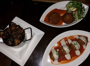 I tried the crabless cakes, the tofu meatballs and the Brussel sprouts, which weren’t on the vegan menu but were able to be veganized.  Just ask your server!  All were delicious! at Wynn Hotel - La Cave in Las Vegas