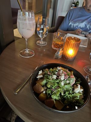 Beet salad and Peachy Keen drink    at Wynn Hotel - La Cave in Las Vegas