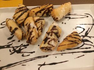 Sugary doughnuts (that were actually pretty salty) with chocolate sauce. They told us it would be ";vegan Nutella";, but the chocolate sauce was far from it. Still good though! Just not the Nutella doughnut I was expecting.  at Sciue Sciue in Florence