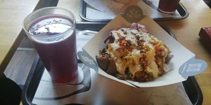 Bowl with Agua de Jamaica at Pot in Bogota