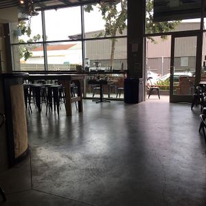 concrete floors and wall. spacious and welcoming  at Harvest Cafe in Ventura