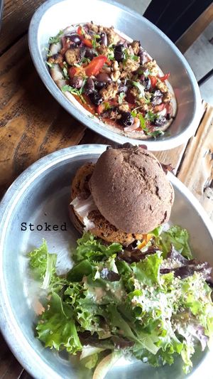 Vegan burger and seasonal pizza  at Harvest Cafe in Ventura