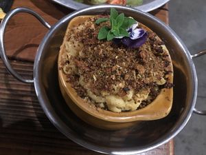 Mac and cheese with coconut bacon crumble  at Harvest Cafe in Ventura