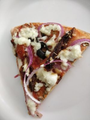 Amazing vegan pizza at Rare Earth Cafe & Organic Store in Mumbai